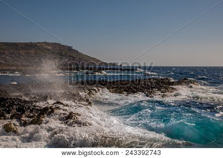 Photo Of Sea Water Beating Against Rock, Cirkewwa, Malta