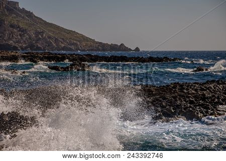Photo Of Sea Water Beating Against Rock, Cirkewwa, Malta
