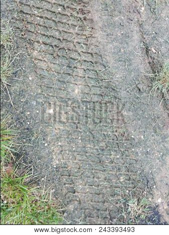 Tire Marks Or Tracks In The Mud Or Dirt