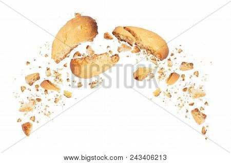 Biscuits Broken Into Two Halves With Falling Crumbs Down, Isolated On White Background