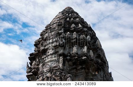 Angkor Wat Temple Single Tower In Front Of Blue Sky With Clouds And Bird