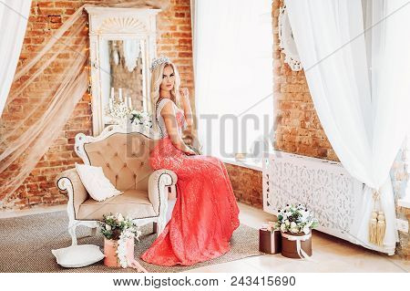 Portrait Of Beautiful Woman With Makeup In Fashion Pink Clothes