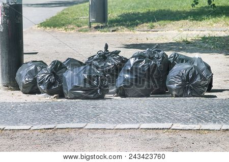 Garbage Bags On The Streets Of The City, Untreated Garbage From The Street, Crowded Monsoon Bags