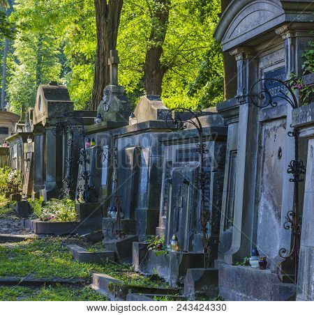 Lviv, Ukraine - May 25, 2018: Graveyard Scene Of Old Polish Graves In Lychakiv Cemetery In Lviv, Ukr