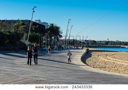 Melbourne, Australia - March 10, 2018: Boardwalk Along The St Kilda Foreshore. St Kilda Is A Fashion