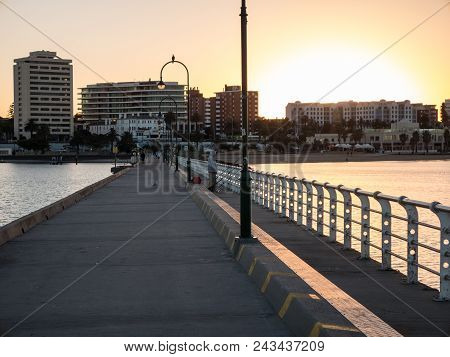 Melbourne, Australia - March 10, 2018: Fisherman On St Kilda Pier, Looking Back Towards The St Kilda