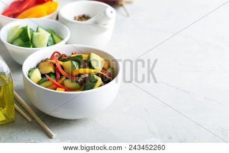 Traditional Asian Stir Fry Salad Contains Meat And Vegetables. Seasoned With Soy Sauce