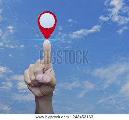 Hand Pressing Map Pin Location Button Over Blue Sky With White Clouds, Map Pointer Navigation Concep