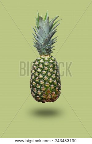 Fresh Pineapple On The Light Rown Colorfurful Background. Creative Image For Modern Designers. Food 