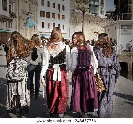 Donosti, December 21, 2014: Group Of Girls Dressed In Typical Costume In Donosti Celebrating Santo T
