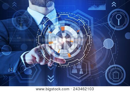 Thoughtful Young Businessman With Digtal Business Interface. Technology, Innovation And Hud Concept.