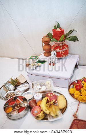 The Ganesha Statue (hindu God Of Wisdom) With Red Velvet Of Kalash On The Back And Worship Items For
