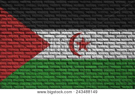 Western Sahara Flag Is Painted Onto An Old Brick Wall