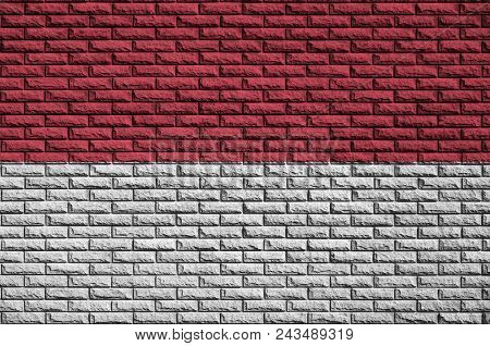 Indonesia Flag Is Painted Onto An Old Brick Wall