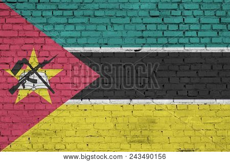 Mozambique Flag Is Painted Onto An Old Brick Wall