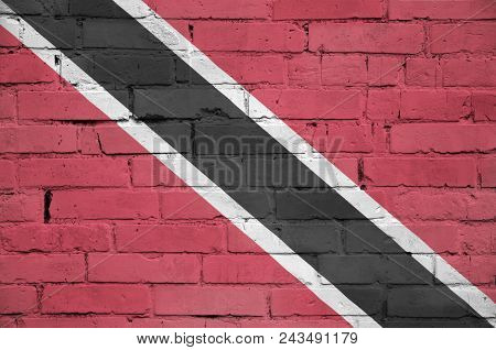 Trinidad And Tobago Flag Is Painted Onto An Old Brick Wall