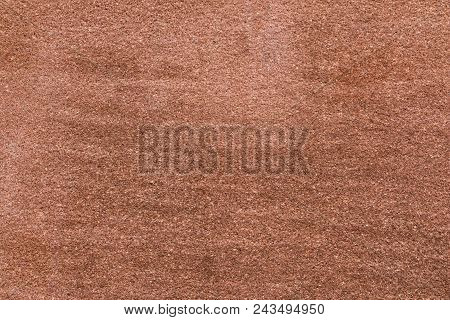 Brown Sandstone Wall Texture Details. Close-up Photo Of Gritty Background. Horizontal Orientation