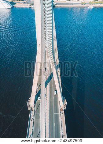 An Aerial View Of The Vansu Bridge Or Suspension Bridge That Spans The River Daugava In The Latvian 