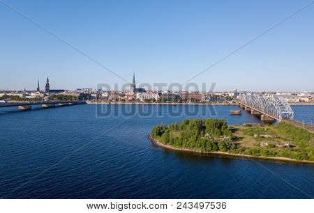 Aerial View Of The Riga City With Old Town, Bridges And River Daugava