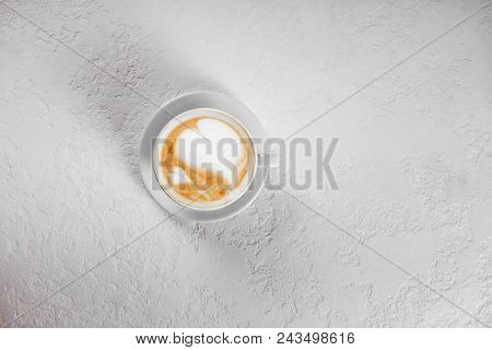 Cup Of Art Latte On A Cappuccino Coffee On White Background