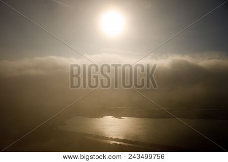 Beautiful Clouds Flying Over The Lake Near Mountains. Evening Time Shot Over The Clouds. Baku, Azerb