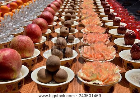 Sacrificial Altar With Offerings Such As Fruits And Flowers In The Wenshu Teple In Chengdu, Sichuan 