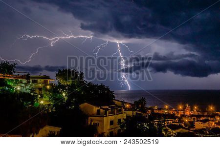 Scenic Lightning Over The Sea At Night