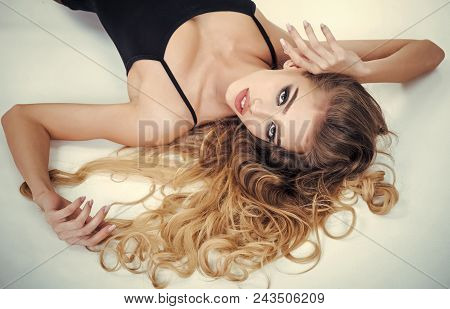 Woman Face Beauty. Ashion Model Girl Portrait With Long Curly Hair. Glamour Beautiful Woman With Hea
