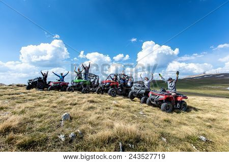 Friends Driving Off-road With Quad Bike Or Atv And Utv Vehicles.