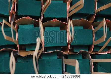 Florist Foam Equipment In Paper Baskets. Floristic Proces. Work Background Isoalted