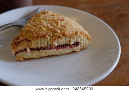 Scones With Strawberry Jam And Cream.