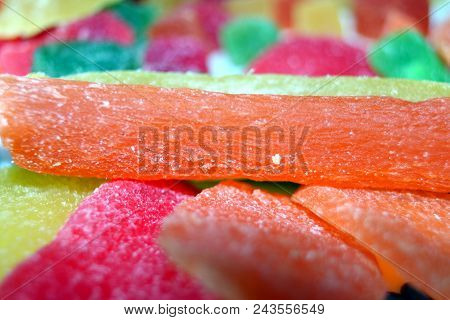 Succade. Background Of Dried And Candied Fruit Close-up. Sun Dried.