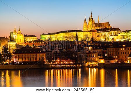 View Of Charles Bridge, Prague Castle And Vltava River In Prague, Czech Republic During Sunset Time.