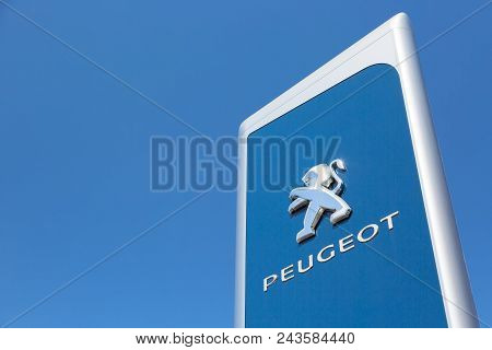 Moscow, Russia - May, 2018: Peugeot Automobile Dealership Sign Against Blue Sky. Psa Peugeot Citroen