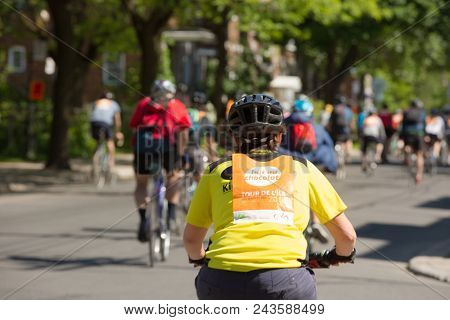 MONTREAL,CANADA- JUNE 3, 2018:  The Tour de l ile is a Sunday biking classic, thousands of cyclists fill the streets of Montreal in Canada.    More than 25 000 people participate at this 34th edition.