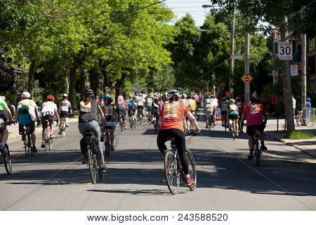 MONTREAL,CANADA- JUNE 3, 2018:  The Tour de l ile is a Sunday biking classic, where thousands of cyclists fill the streets of Montreal in Canada.  