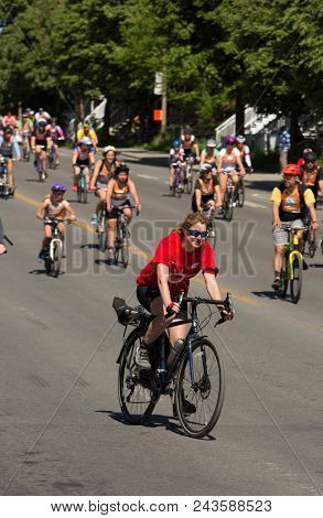 MONTREAL,CANADA- JUNE 3, 2018:  The Tour de l ile is a Sunday biking classic, where thousands of cyclists fill the streets of Montreal in Canada.  