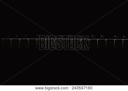 Black And White Piano Keys In Dark Ambiance. Accentuated Highlights.