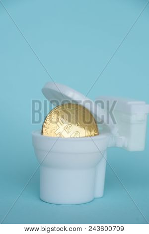 Bitcoin Is Poured Into The Toilet Bowl