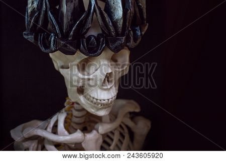 The Skull In The Crown. Grim Necromancer In Gothic Crown. Black Background, Halloween Concept, Free 
