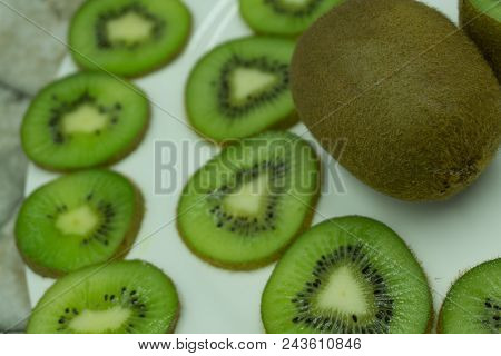 Fresh Organic Kiwi Fruit Sliced Food Frame With Copy Space For Your Text. Banner. Green Kiwi Circles