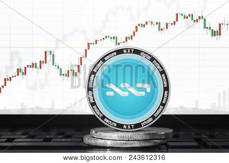 Nxt (nxt) Cryptocurrency Nxt Coin On The Background Of The Chart