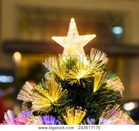 Details of a fiber-optic decorated Christmas Tree with dectoration