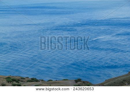Beautiful Sea With Blue Calm Water And Rocks Landscape. Tourism Concept.