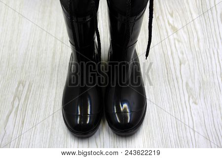 Black Rubber Boots Isolated On White Background