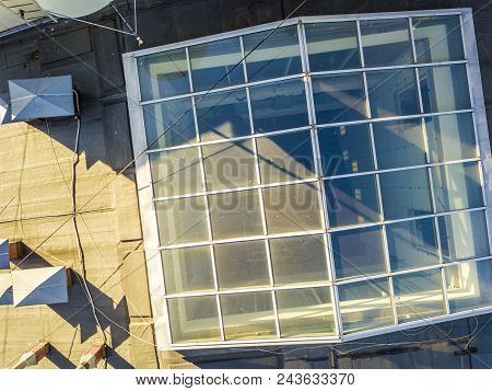 Futuristic Top Down Of Glass Rofftop Of A Building