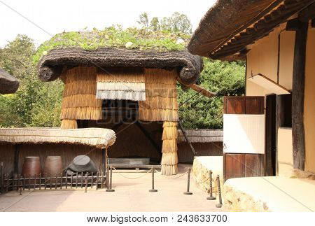 NORTH KOREA, PYONGYANG - SEPTEMBER 26, 2017: The famous bent jug in inner courtyard by house in which the president Kim Il Sung was born and lived with his grandparents. Pyongyang, Mangyongdae, DPRK