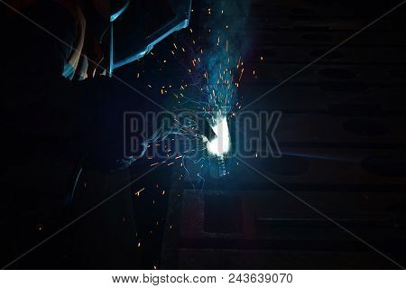 Welder At Work For Close-up Work, Joining Parts With Welding.