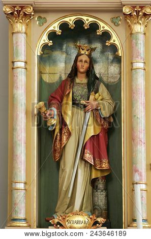 SISAK, CROATIA - DECEMBER 07: Statue of Saint Barbara on the altar of Our Lady in the Church of Holy Cross in Sisak, Croatia, on December 07, 2017.