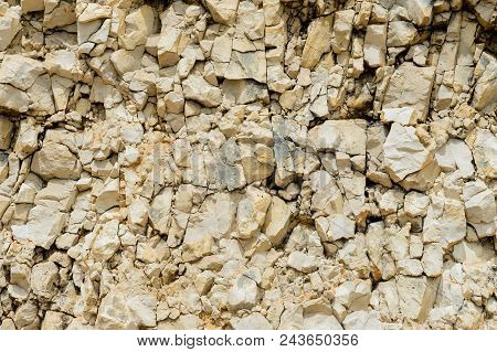 Textured Stone Background Rubble Ballast In Natural Form In The Rock Wall.